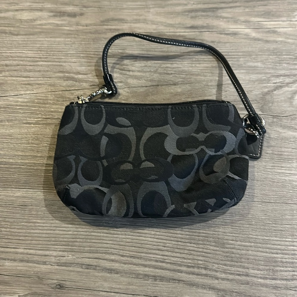 black vintage coach wristlet great for going out